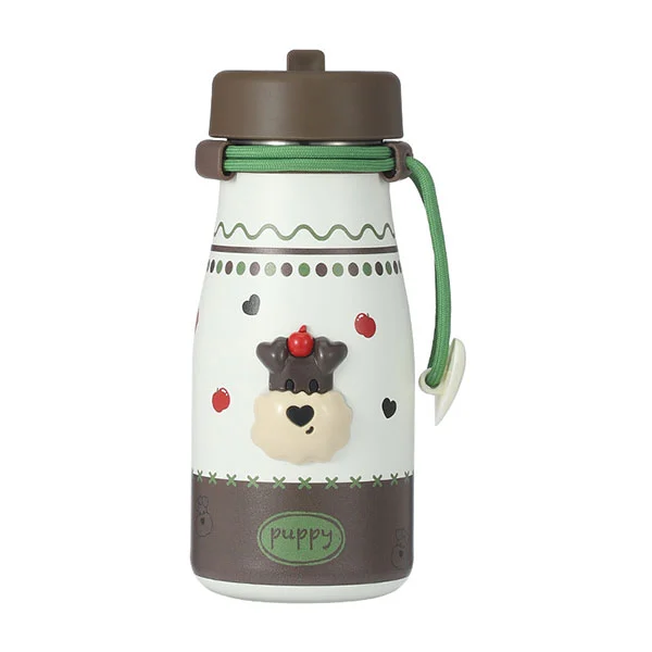 Ruostumattomasta teräksestä valmistettu maitopullo oljella